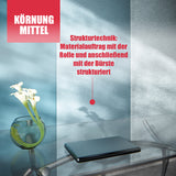 Tisch, Vase, Text über Strukturtechnik.