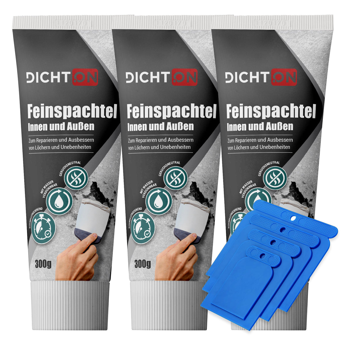 Drei Tuben Spachtelmasse mit Spachteln.