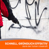 Graffiti-Entfernung von einer Wand.