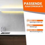 Küche mit Produktinformationen an Wand.